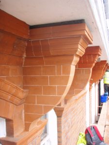 Repairing damaged corbels